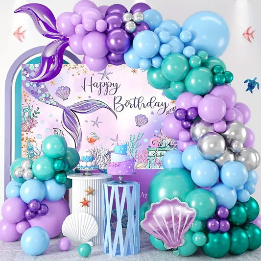 Mermaid purple birthday party set with tableware, balloons, cake toppers, and decorations.