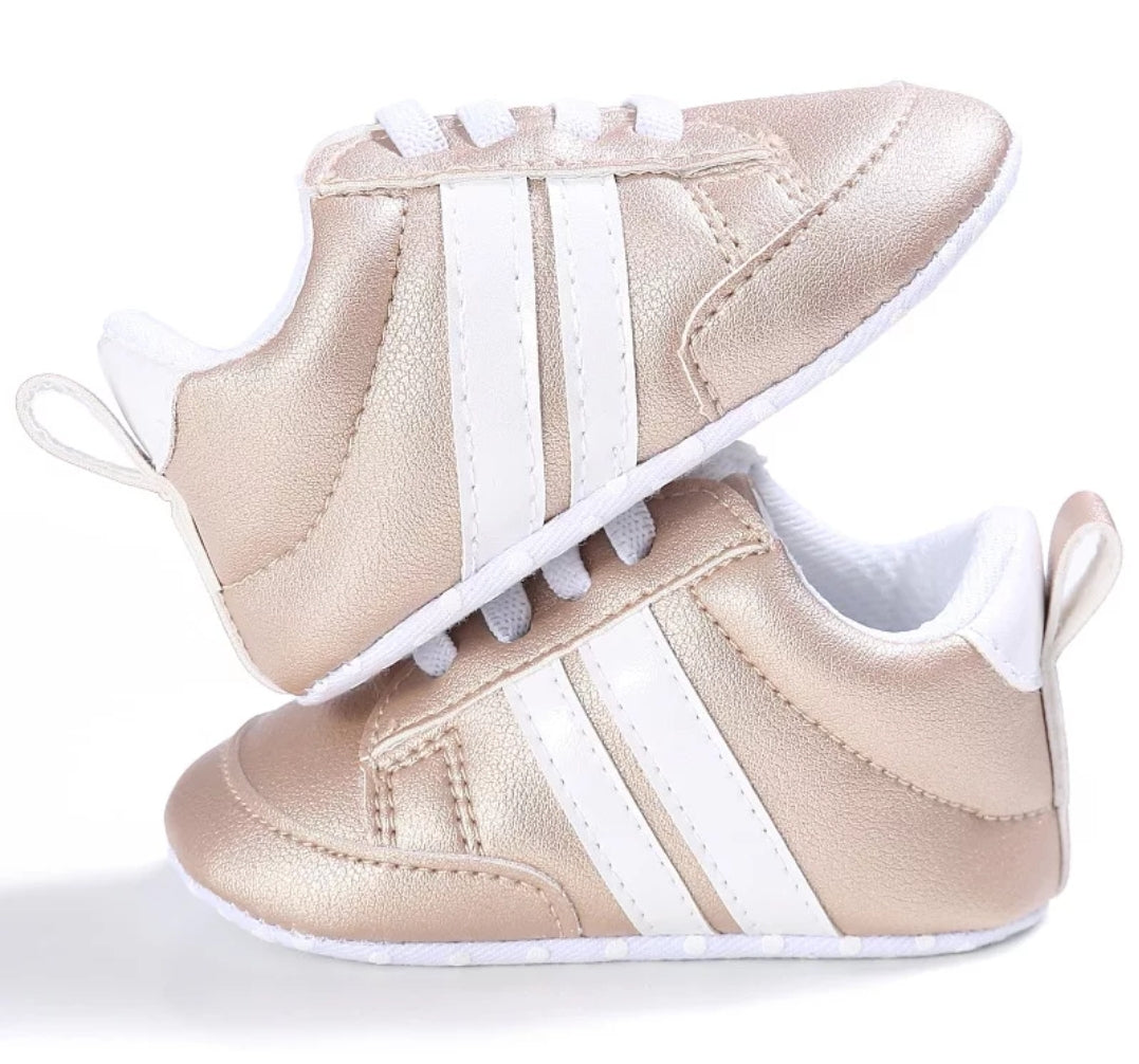 Gold Sneakers with White Stripes 