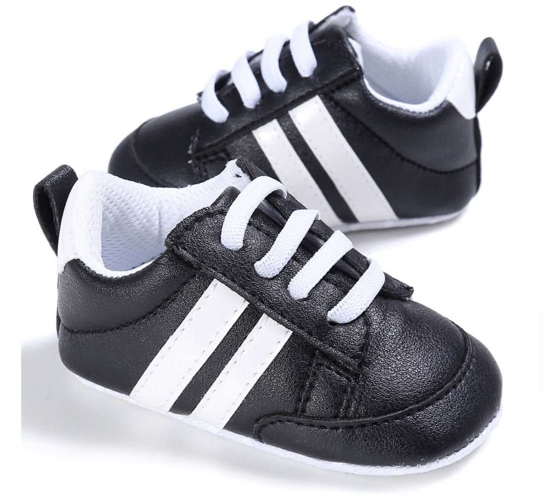 Black Sneakers with White Stripes