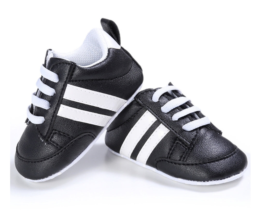 Black Sneakers with White Stripes