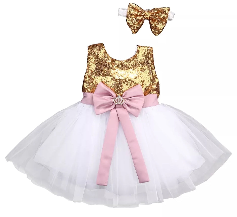 White Dress with Gold Sequins, Dusty Pink Bow, Headband and Crown Brooch.